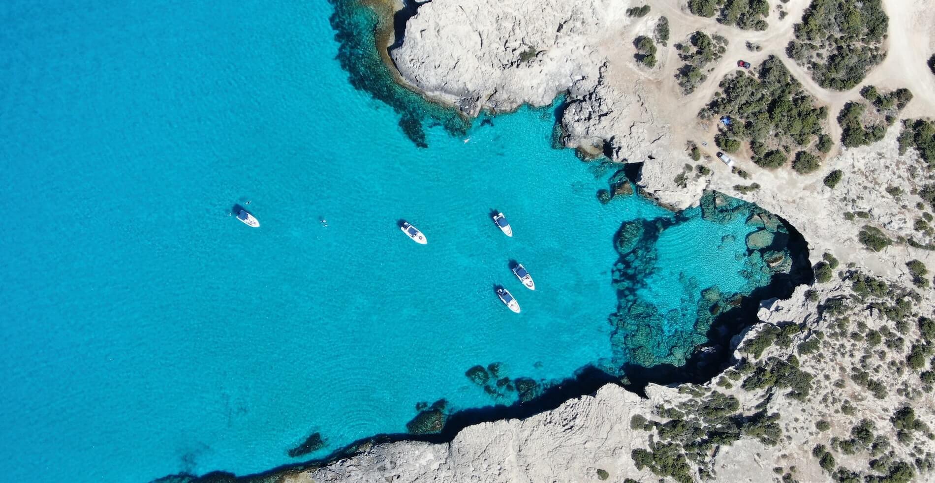 blue lagoon aerial photo with boats