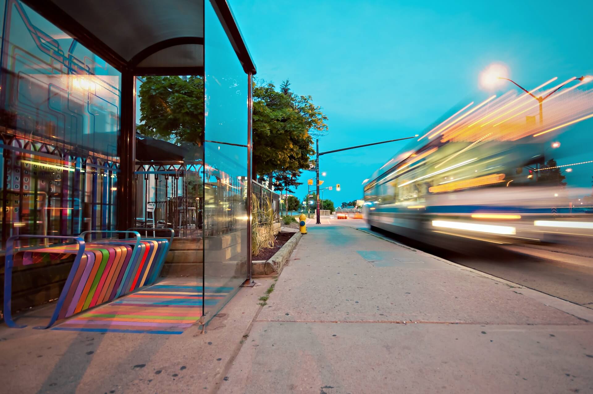 bus stop passing by bus